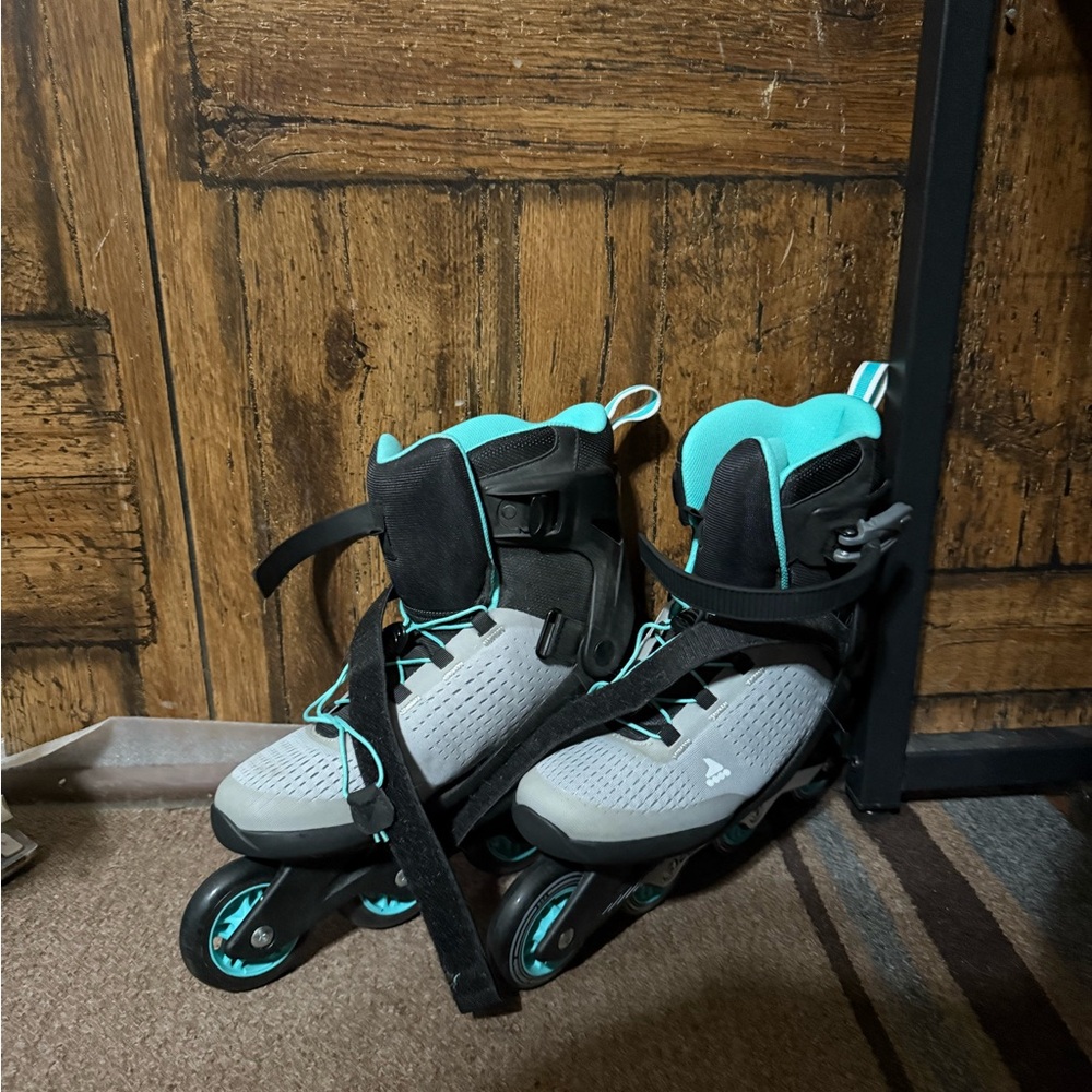 Gray and Teal Inline Skates